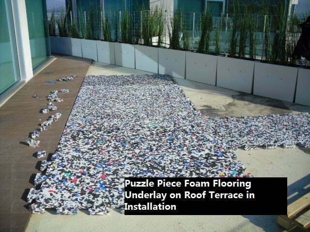 Foam Shock Pad - Interlocking Puzzle Piece Installation on Roof Terrace Foam Shock Pad - Interlocking Puzzle Piece Installation on Roof Terrace