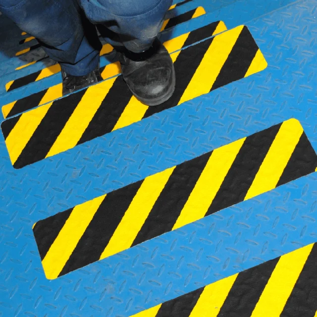 RC3406-HAZ Conformable Grip Tape - Black / Yellow Hazard Installed on Metal Steps