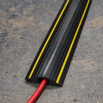 CP-10003 - Hazard Warning Cable Protector - 71mm x 13mm - Protecting red network cable